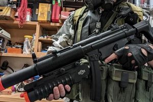 Enhance Your Airsoft Game: Underbarrel Grenade Launchers Guide Ultimate Airsoft Guide for Beginners, Tactics & Gear Reviews Enhance Your Airsoft Game: Underbarrel Grenade Launchers Guide | Ultimate Airsoft Guide for Beginners, Tactics & Gear Reviews